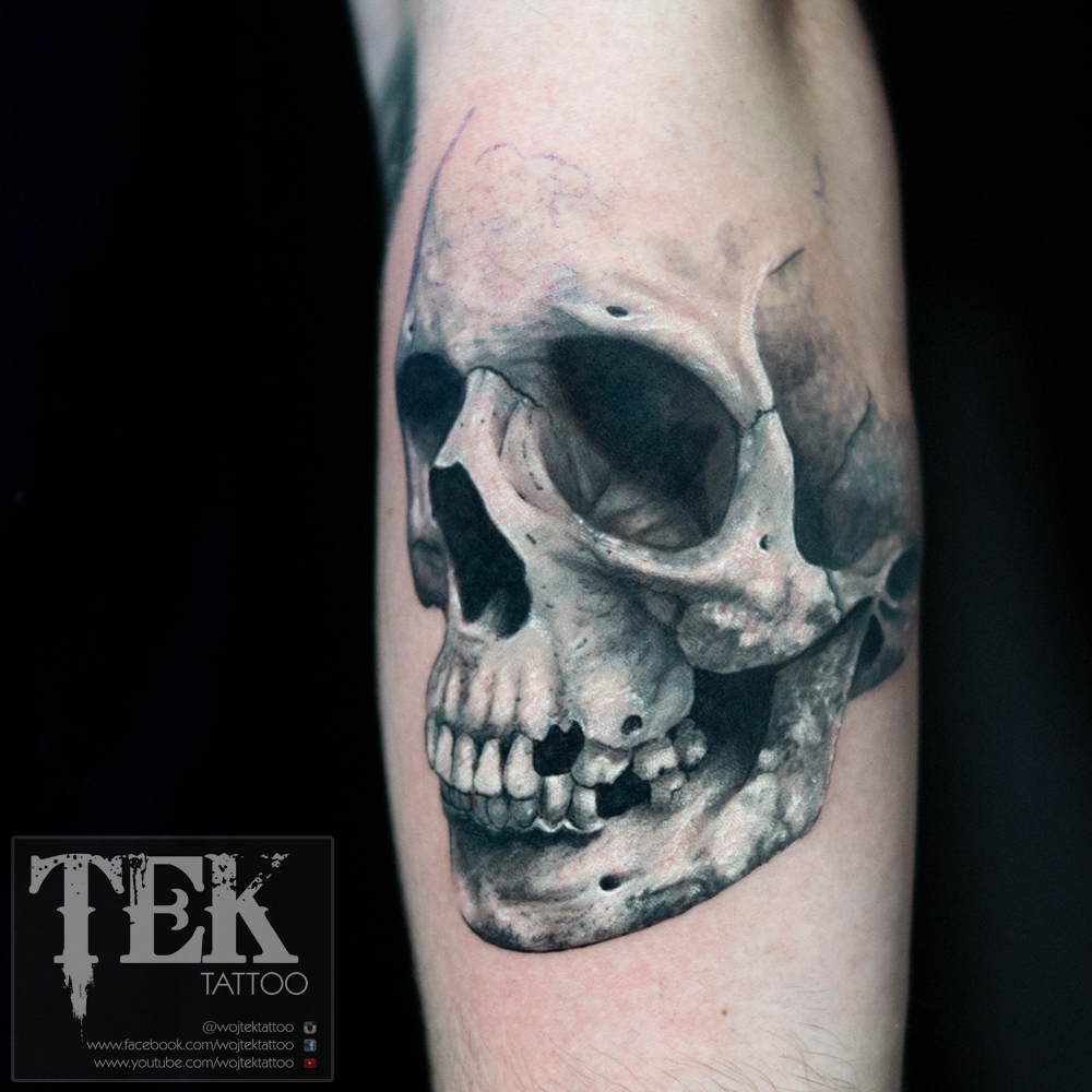 Black and grey skull tattoo