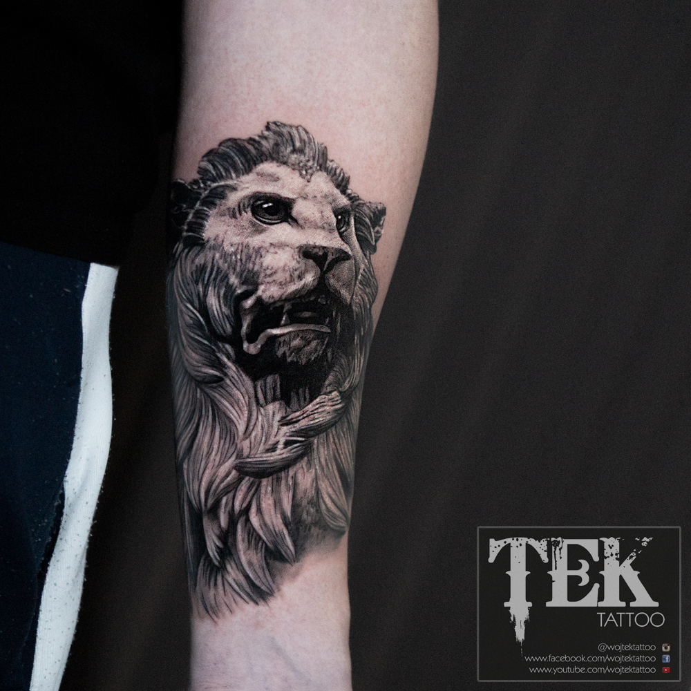 Greek lion sculpture tattoo.